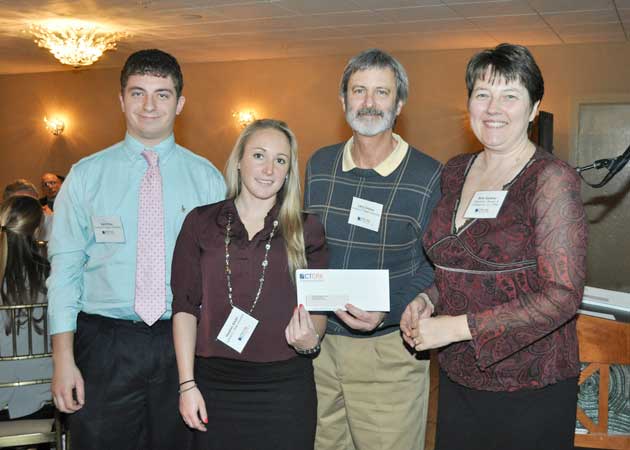 Heather receiving grant funds on behalf of CCSU.