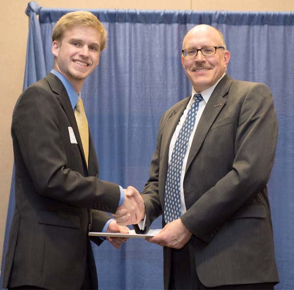 Zachary Paquin, an accounting major at UConn, was presented with Forensic Accounting Services’s annual forensic accounting scholarship.
